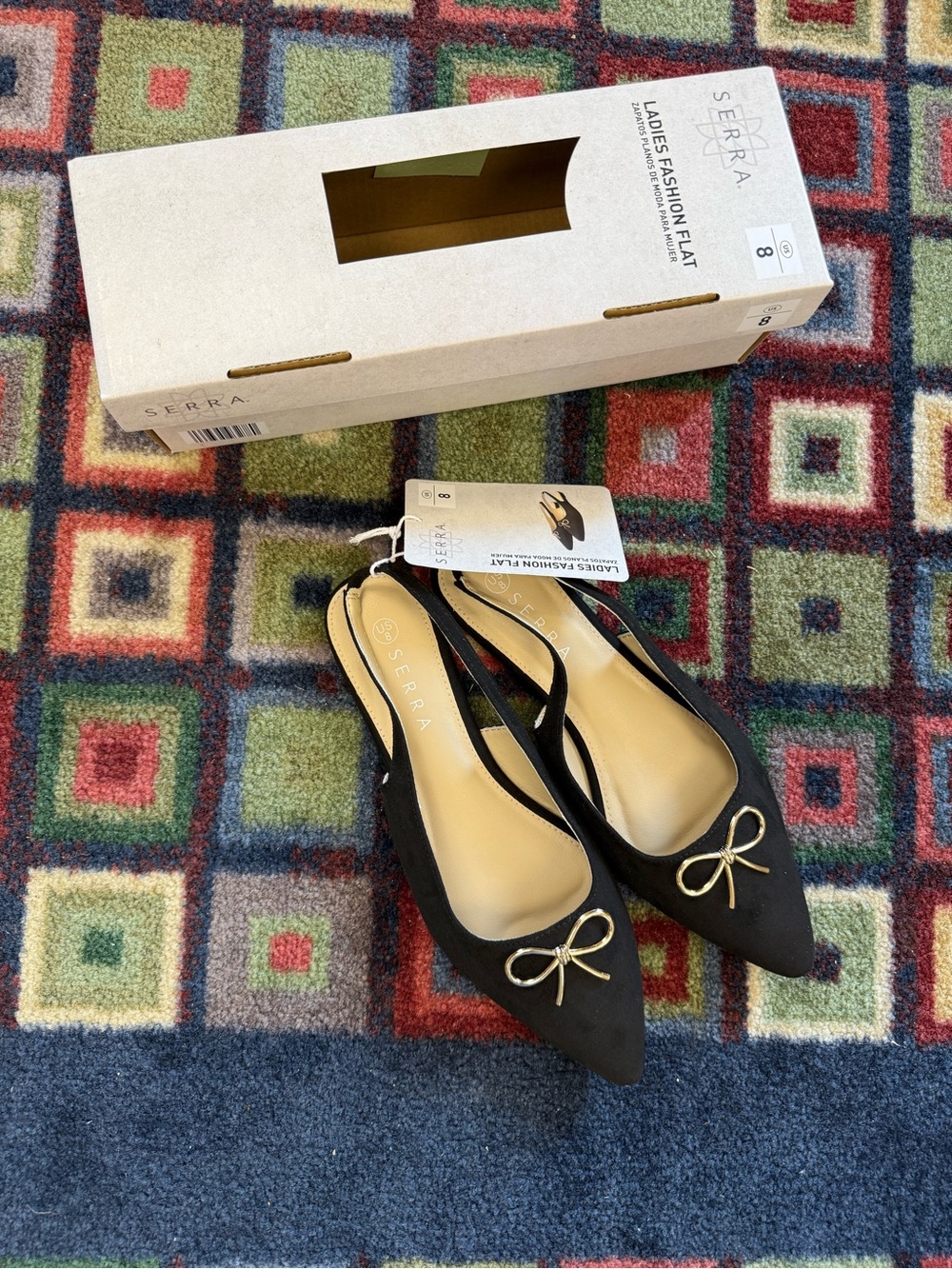 Serra Black Pointed Slingback Flats with Gold Bow Accent